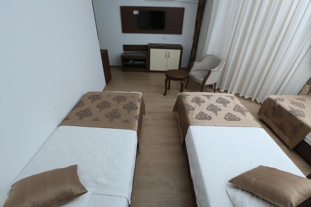 Standard Double or Twin Room with Side Sea View,37601389:JPEG